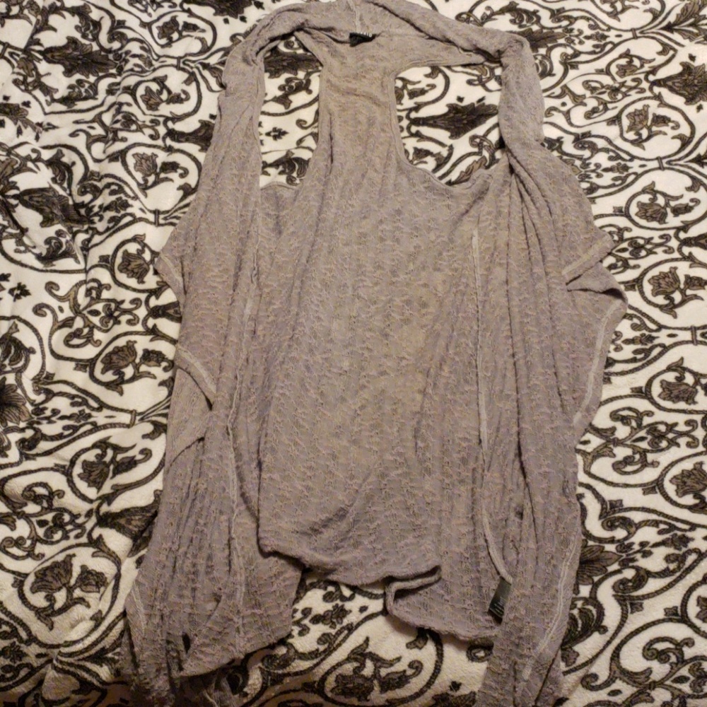 Long Sleeveless Duster